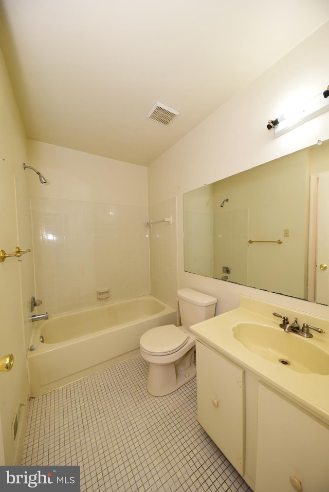 bathroom featuring toilet, vanity, visible vents,  shower combination, and tile patterned floors