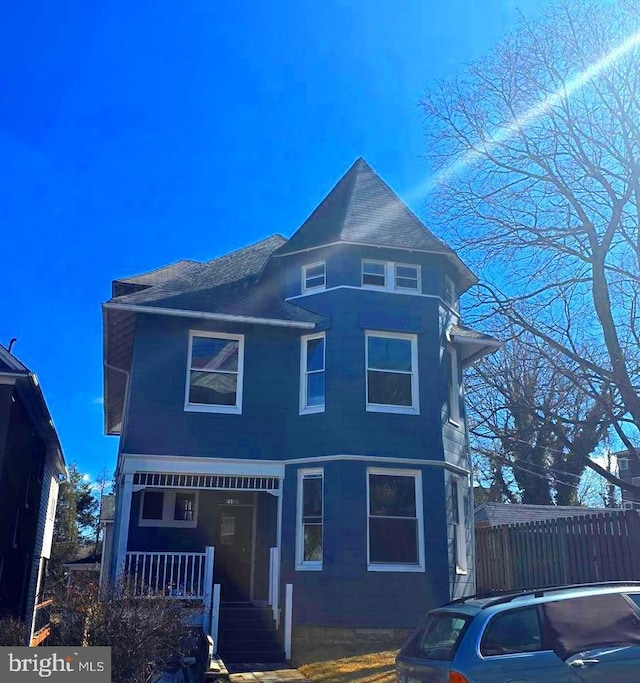 victorian-style house with covered porch