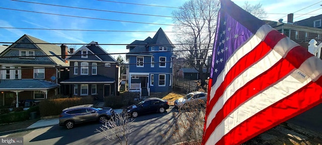 view of front of home with a residential view