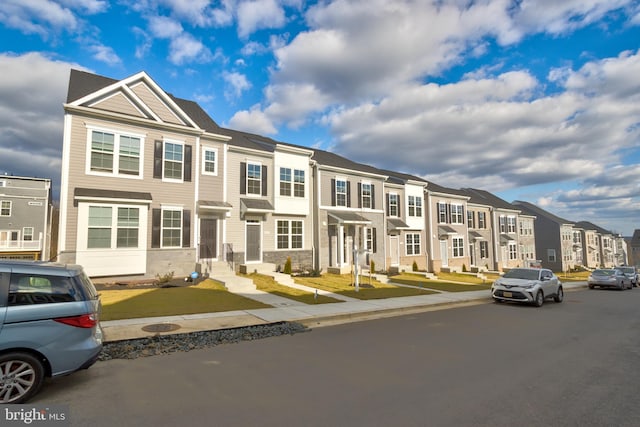 view of property with a residential view