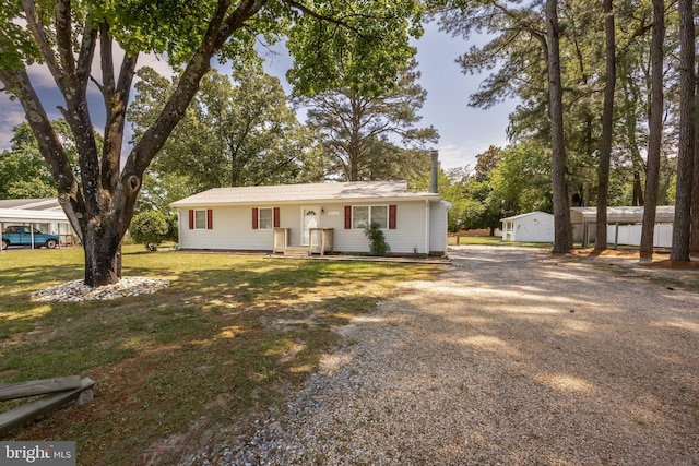 2115 Ruxton Dr, Salisbury, MD 21801 - view of front of house featuring gravel driveway and a front lawn