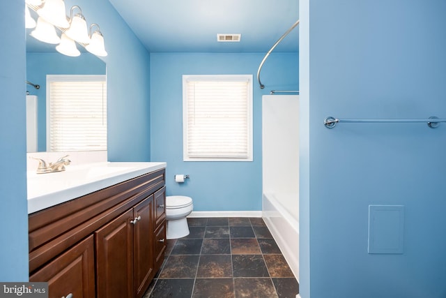 2115 Ruxton Dr, Salisbury, MD 21801 - full bath with toilet, vanity, bathing tub / shower combination, a chandelier, and baseboards