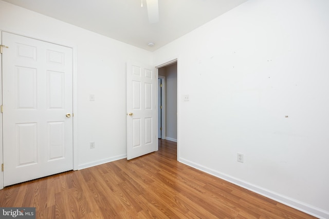 2115 Ruxton Dr, Salisbury, MD 21801 - unfurnished bedroom with light wood-style flooring, baseboards, and a ceiling fan