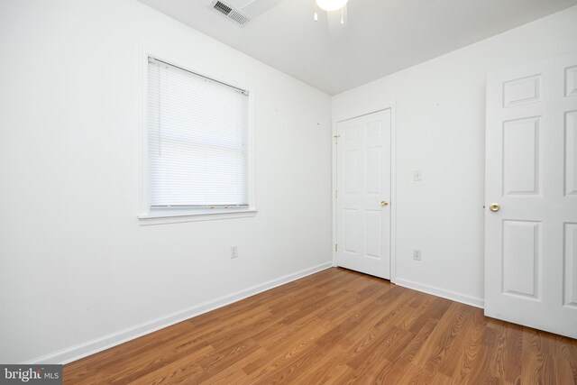 2115 Ruxton Dr, Salisbury, MD 21801 - unfurnished bedroom with light wood finished floors and baseboards