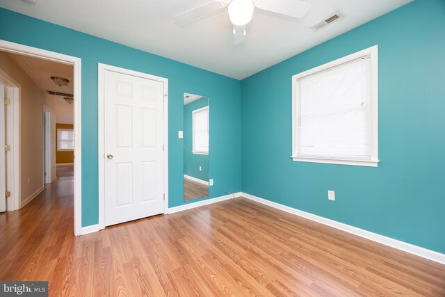 2115 Ruxton Dr, Salisbury, MD 21801 - unfurnished bedroom featuring wood finished floors, baseboards, and a ceiling fan