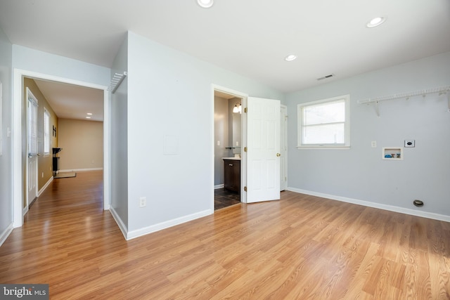 2115 Ruxton Dr, Salisbury, MD 21801 - laundry area featuring electric dryer hookup, washer hookup, light wood finished floors, baseboards, and recessed lighting
