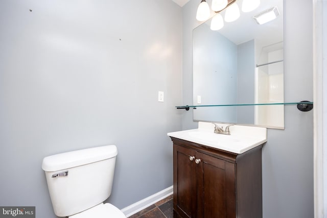 2115 Ruxton Dr, Salisbury, MD 21801 - bathroom featuring baseboards, vanity, and toilet