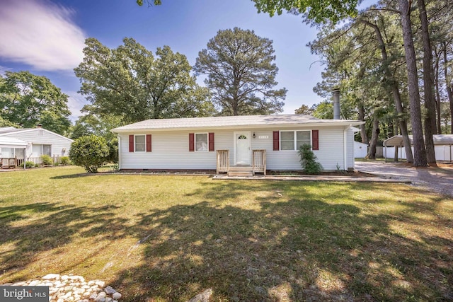 2115 Ruxton Dr, Salisbury, MD 21801 - view of front of property with a front lawn, a shed, and an outdoor structure