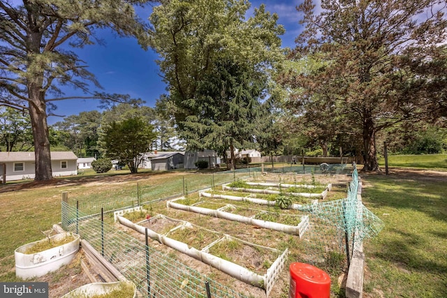 2115 Ruxton Dr, Salisbury, MD 21801 - view of green lawn featuring a vegetable garden