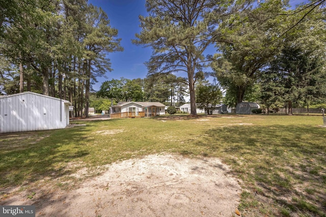2115 Ruxton Dr, Salisbury, MD 21801 - view of grassy yard featuring an outdoor structure