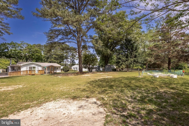 2115 Ruxton Dr, Salisbury, MD 21801 - view of grassy yard featuring a wooden deck
