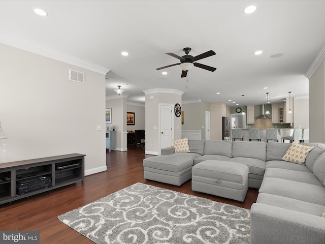 living room featuring recessed lighting, crown molding, and dark wood-type flooring