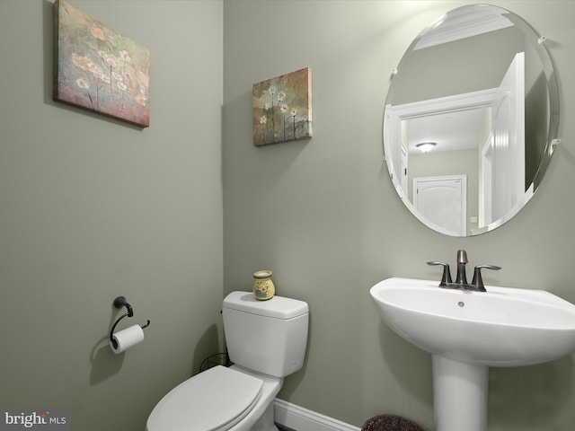 bathroom with a sink and toilet