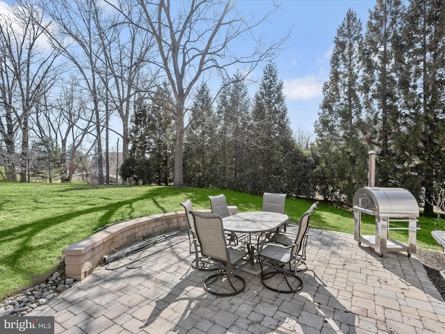 view of patio / terrace with outdoor dining area and grilling area