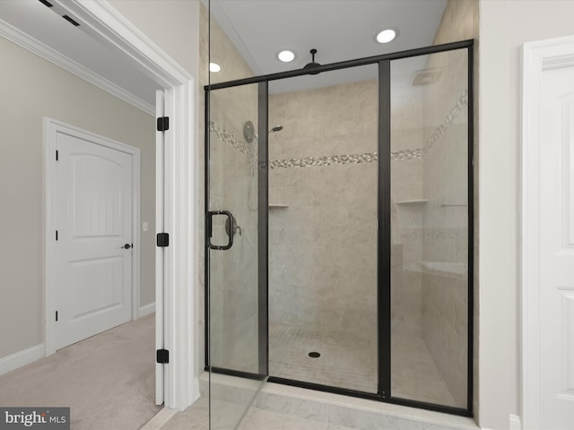 full bathroom featuring recessed lighting, a shower stall, crown molding, and baseboards