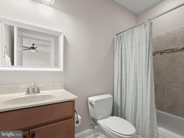 full bath featuring vanity, toilet, baseboards, and shower / tub combo with curtain