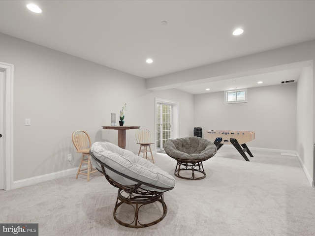 sitting room featuring recessed lighting, visible vents, baseboards, and carpet