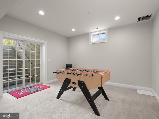 game room featuring carpet, visible vents, and baseboards