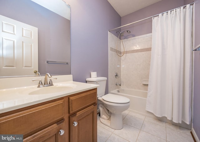 full bathroom featuring toilet, tile patterned flooring, shower / bath combo with shower curtain, and vanity