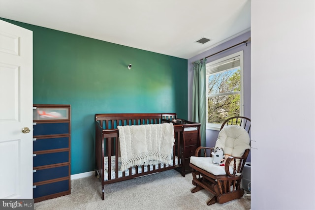 3246 Blundell Rd, Falls Church, VA 22042 - carpeted bedroom with baseboards, visible vents, and a nursery area