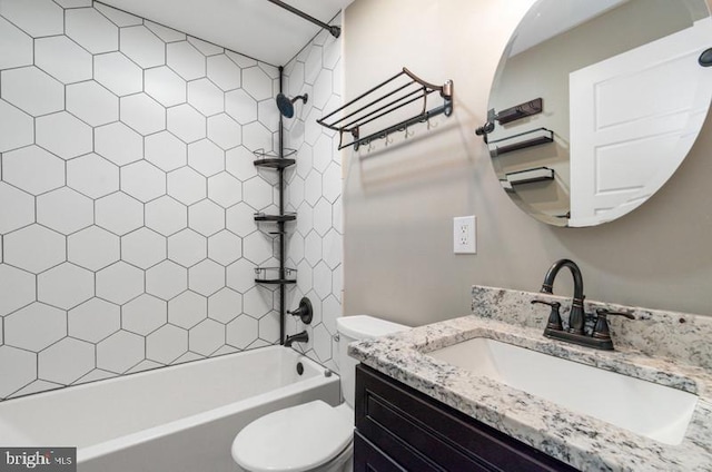 full bathroom with vanity, toilet, and shower / bathtub combination