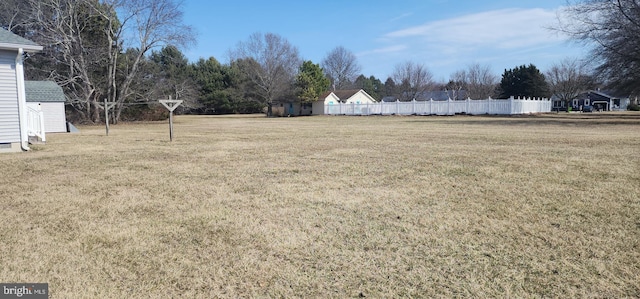 view of yard featuring fence