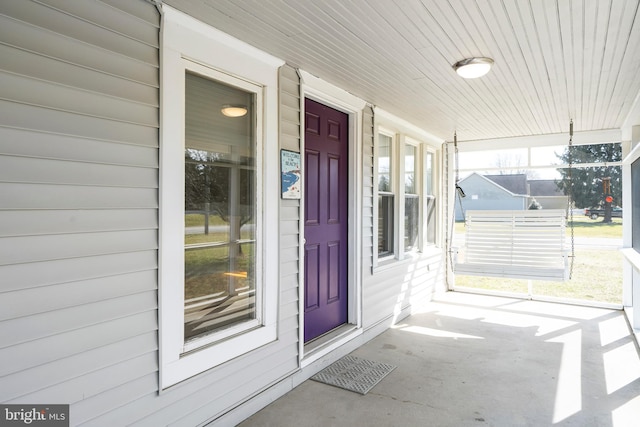 entrance to property with covered porch