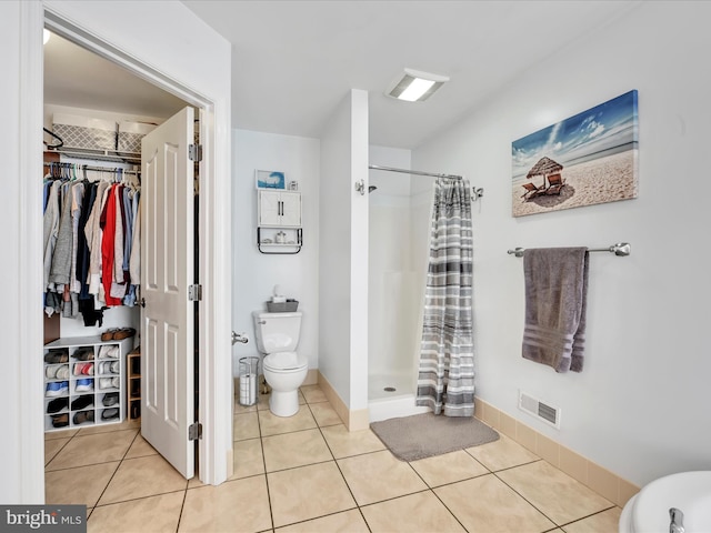 full bathroom with toilet, a stall shower, tile patterned flooring, and visible vents