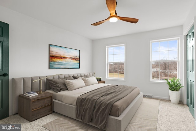 bedroom featuring visible vents and a ceiling fan