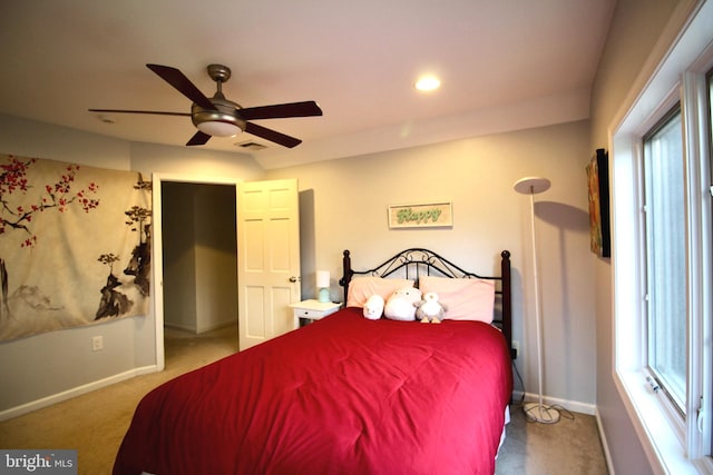 bedroom featuring baseboards, carpet, a ceiling fan, and visible vents