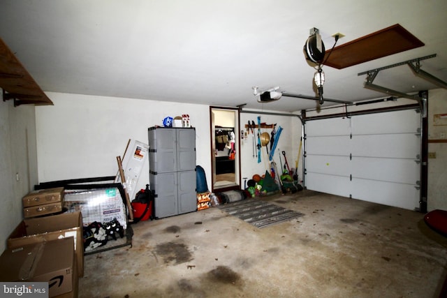 garage featuring a garage door opener