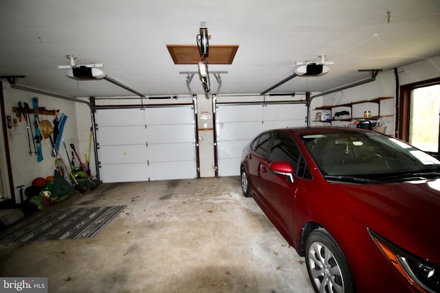 garage featuring a garage door opener