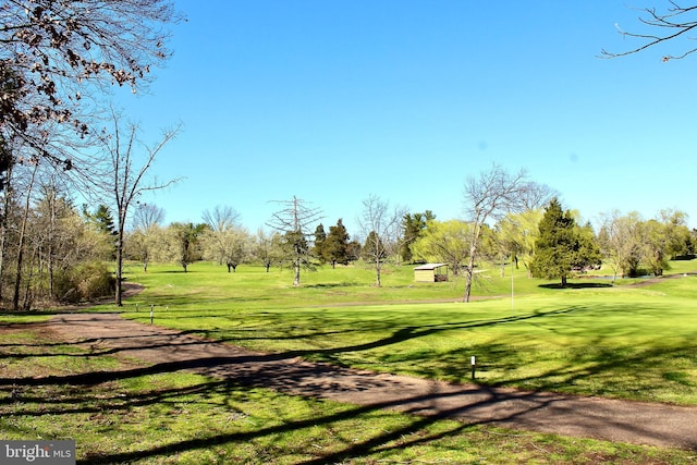 view of home's community featuring a lawn