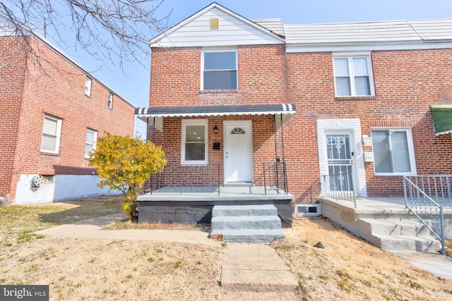 view of front of property with brick siding