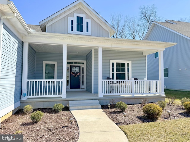 view of front of property featuring covered porch and board and batten siding