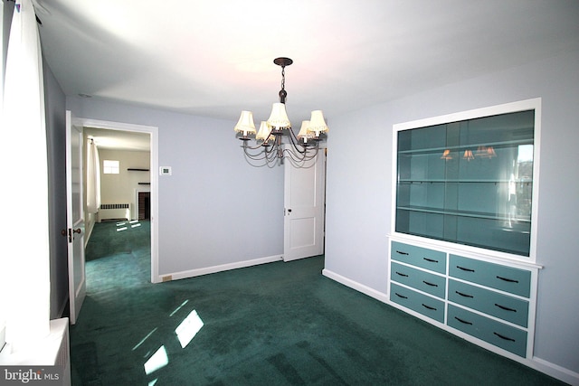 unfurnished dining area featuring baseboards, radiator heating unit, dark colored carpet, a fireplace, and a notable chandelier