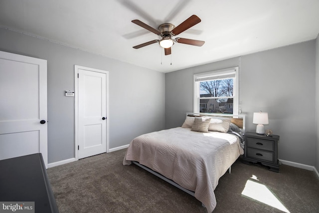 bedroom featuring baseboards, carpet floors, and ceiling fan