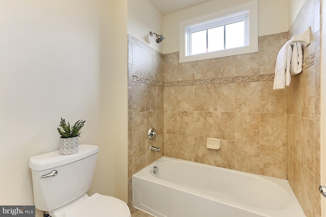 full bath with toilet and washtub / shower combination