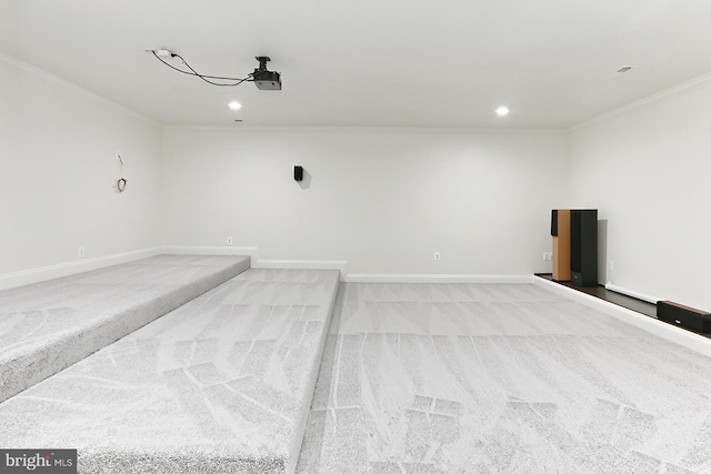 garage featuring recessed lighting and baseboards