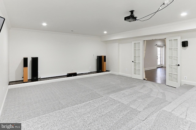 spare room with baseboards, crown molding, french doors, carpet floors, and recessed lighting