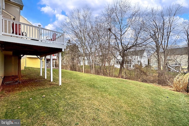 view of yard featuring a wooden deck