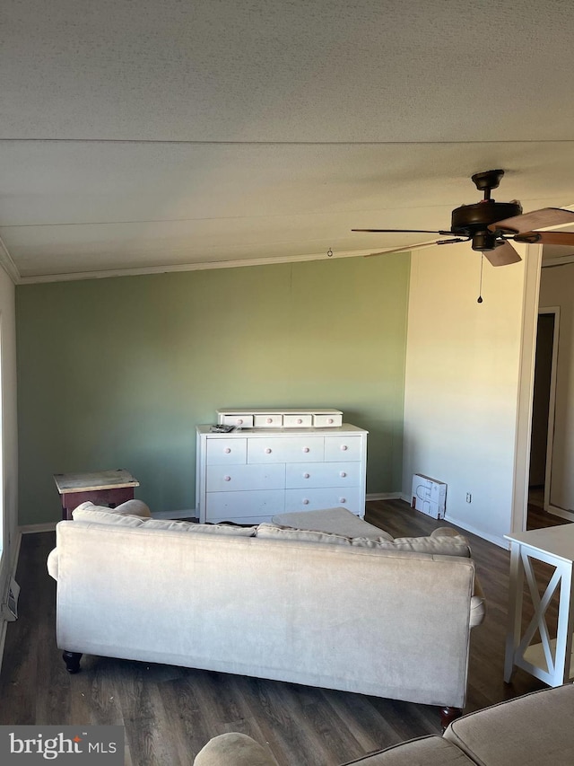 living room featuring a ceiling fan, dark wood finished floors, and baseboards