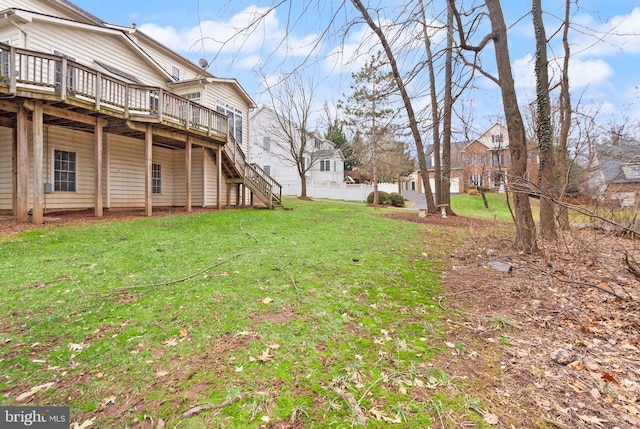 view of yard with stairway and a wooden deck