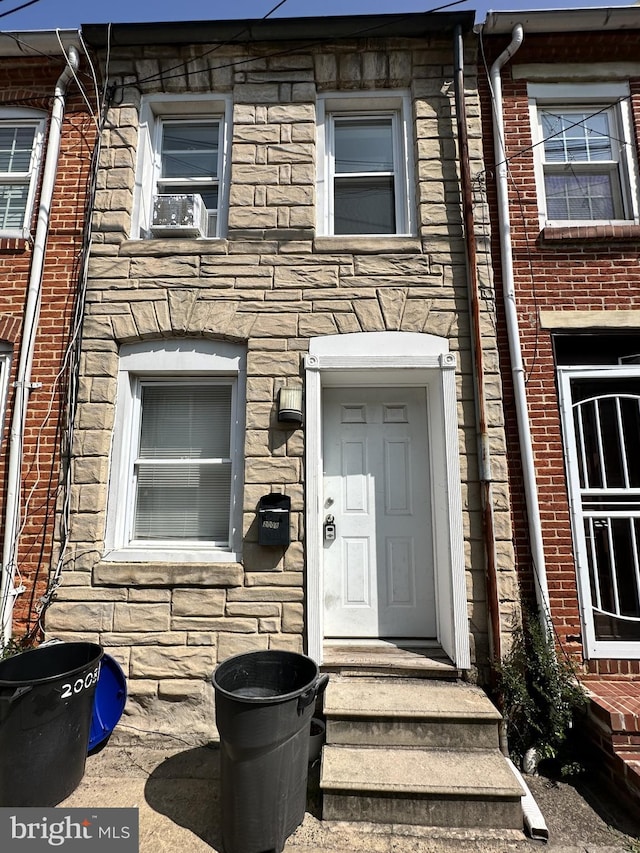 view of front facade featuring stone siding