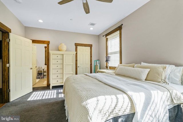 bedroom featuring ceiling fan, dark colored carpet, visible vents, and recessed lighting