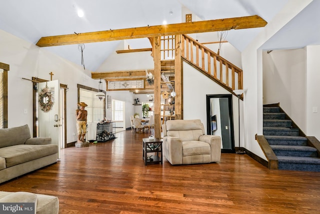 living room featuring high vaulted ceiling, stairs, beam ceiling, and wood finished floors