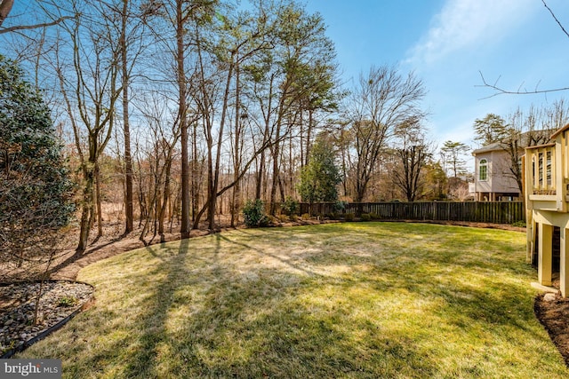 view of yard featuring fence