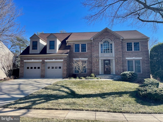 view of front of home with brick siding, concrete driveway, roof with shingles, an attached garage, and a front yard