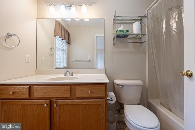 full bathroom featuring shower / bath combo, vanity, and toilet