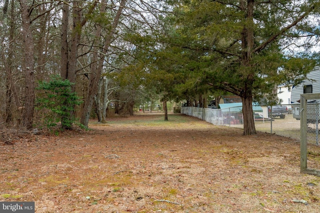 view of yard with fence